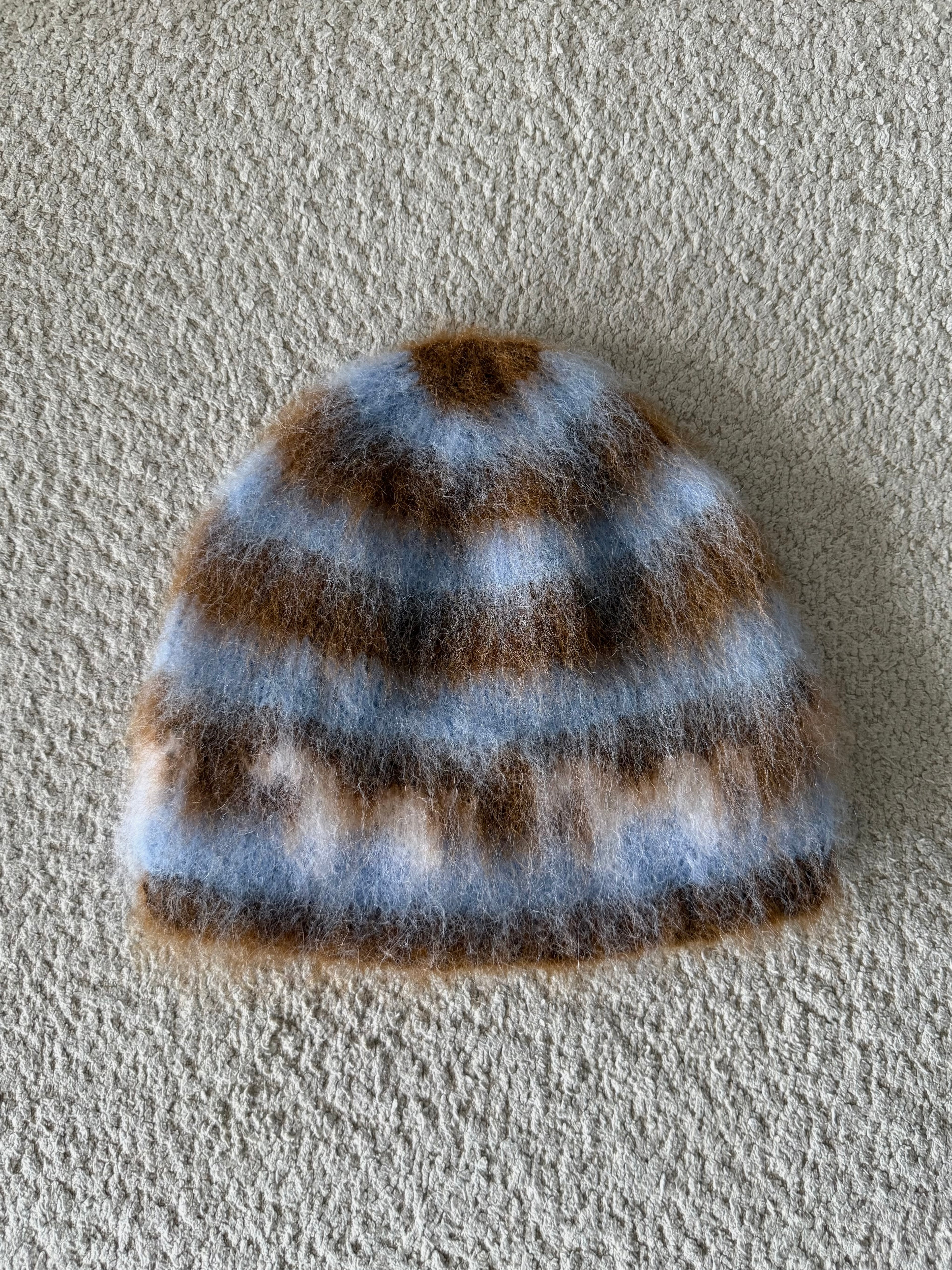 Stripete børstet lue